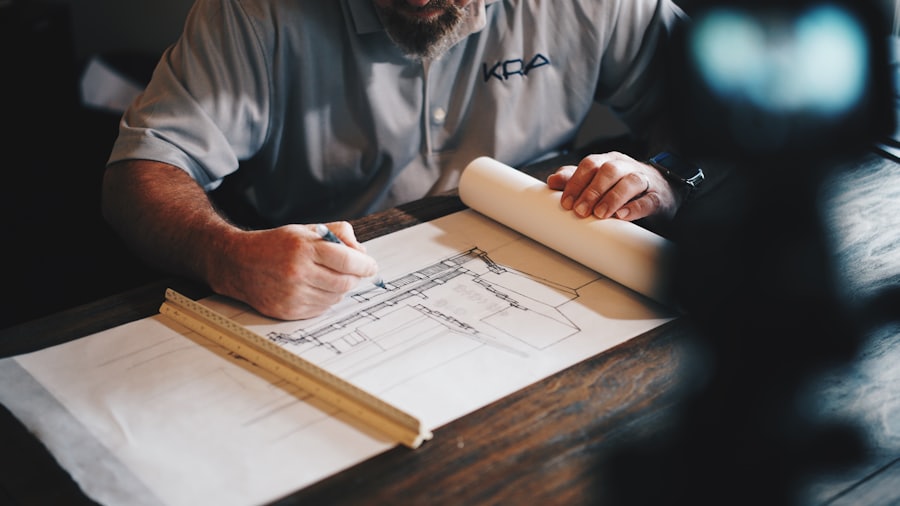 An architect drawing house plans for a new build